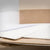 Folhas de papel multicozeduras branco e kraft empilhadas — RAS Embalagens