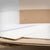Folhas de papel multicozeduras branco e kraft empilhadas — RAS Embalagens